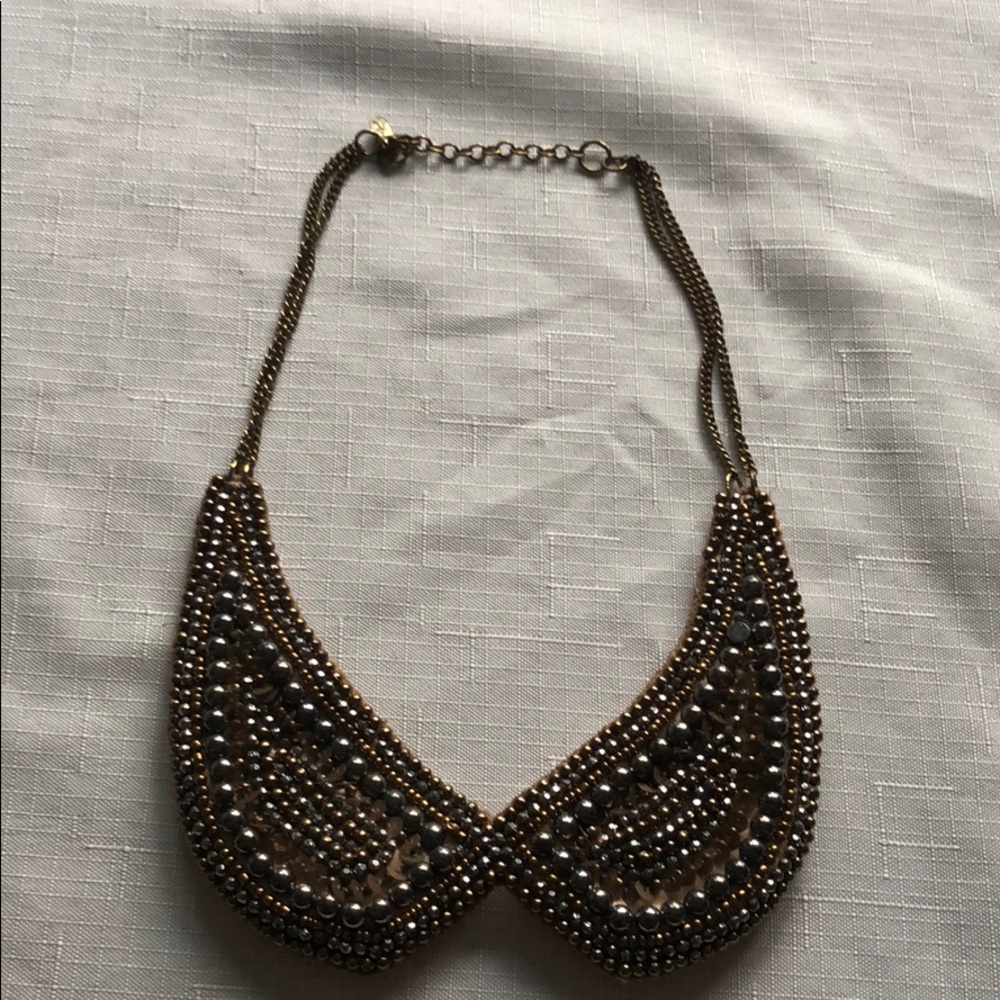 Gold collared necklace